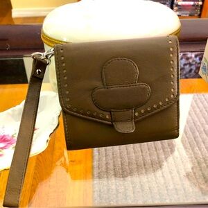 Small All leather wristlet.